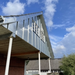 Zinkinddækning på gavl og facade under udhæng i Nyborg på Fyn
